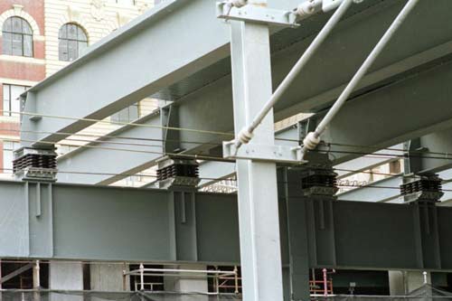 Isolation bearing supporting steel beams